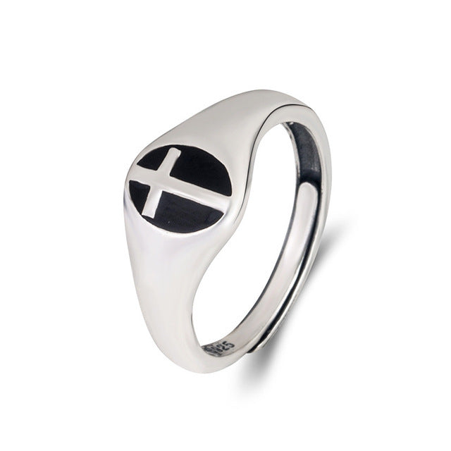A silver Hip Hop Index Finger Ring with a cross on it, by Maramalive™.
