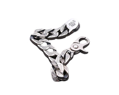 A Retro Men's Silver Bracelet - Innovative Spring Hole Design with an octopus on it by Maramalive™.
