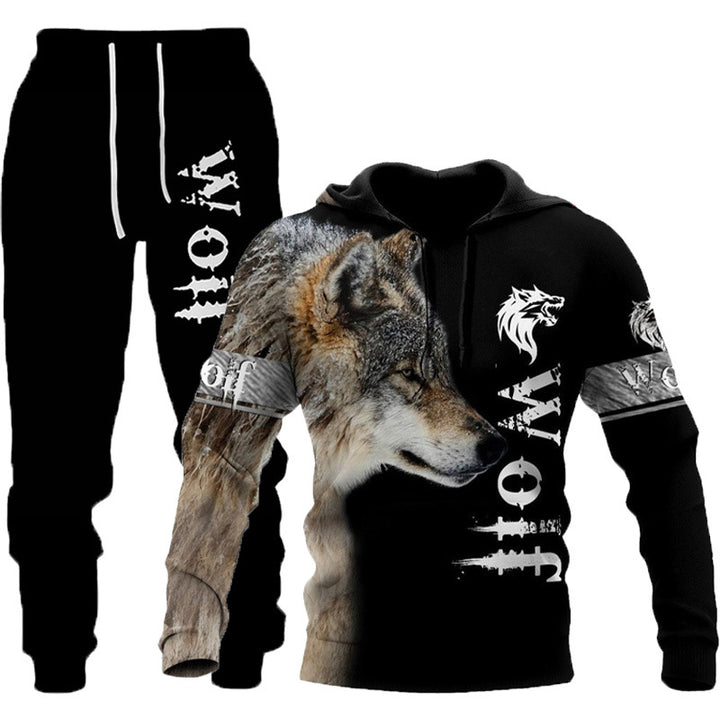 A black Hooded Tracksuit with Three-dimensional Art by Maramalive™ featuring a large wolf graphic and "WOLF" text printed on the hoodie and pants, with additional smaller graphics and text. Its punk rock style brings a bold edge to your wardrobe while subtly incorporating elements of three-dimensional art.