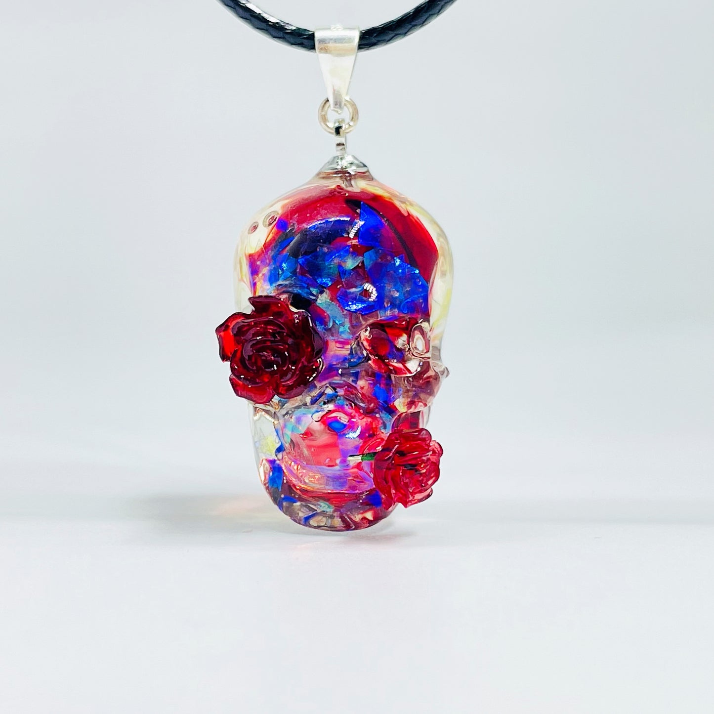 A Personality Gothic Halloween Gift Necklace Lovers with red and blue flowers on it by Maramalive™.