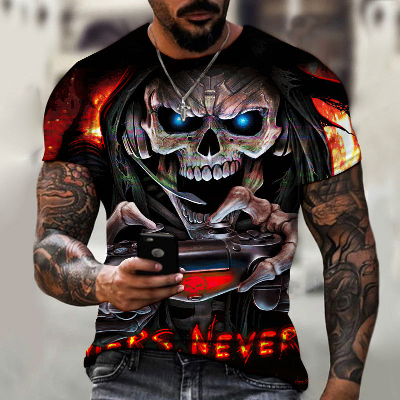 A man with tattoos on both arms wears the Maramalive™ New Summer Horror Skull 3d Men's T-shirt featuring a fierce, blue-eyed skull holding a video game controller. Made with polyester fiber and boasting 3D digital printing, the shirt's design stands out. The background is blurred as he holds a smartphone in his left hand.