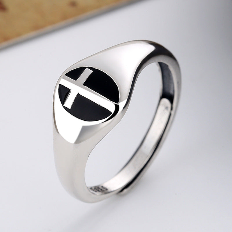 A silver Hip Hop Index Finger Ring with a cross on it, by Maramalive™.