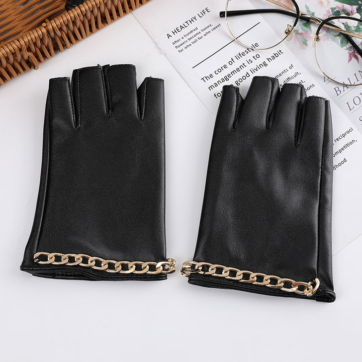 A group of Steampunk Half Finger Gloves - Fashion Statement in PU Leather by Maramalive™ on a table.