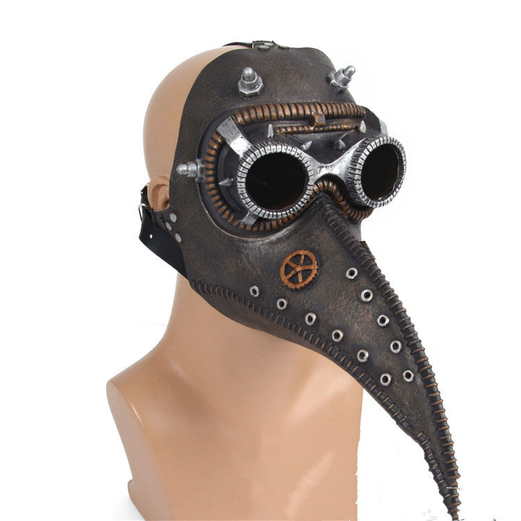 A Maramalive™ Halloween New Product Steampunk Plague Doctor Beak Mask with black color, red eyes and spikes.