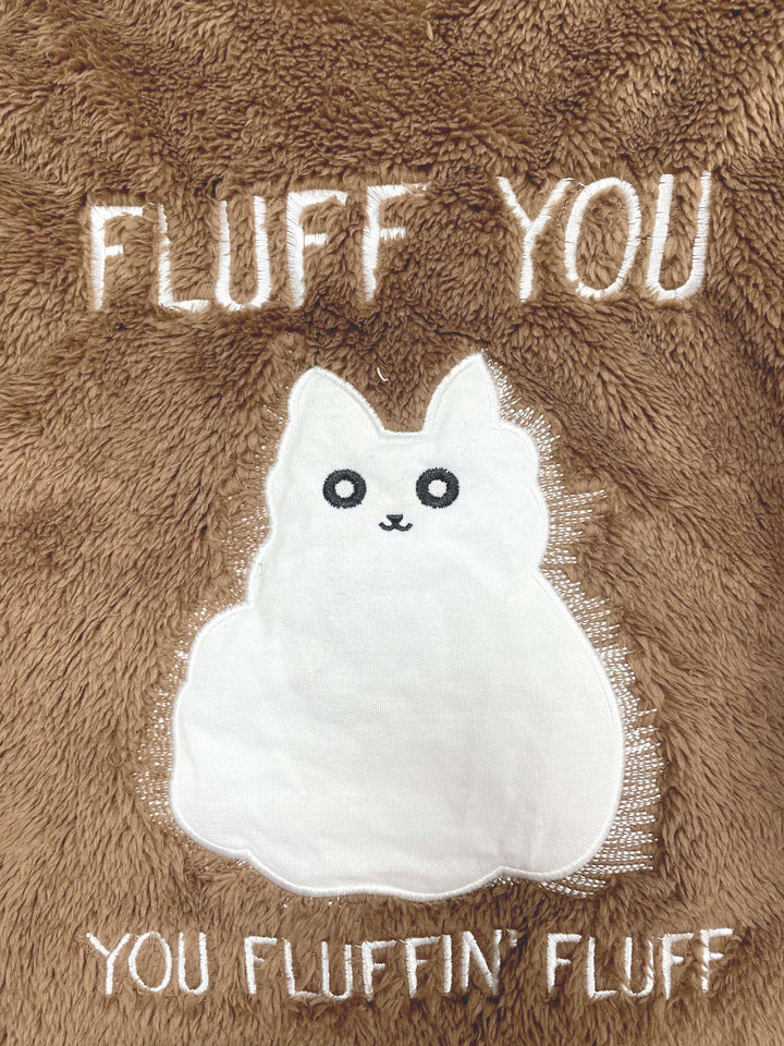Embroidery of a white cartoon cat on a brown, fluffy background with text that reads, "FLUFF YOU" and "YOU FLUFFIN' FLUFF," perfect for Maramalive™ Plus Size Casual Sweatshirt, Women's Plus Slogan & Cat Print Fleece Button Decor Long Sleeve Cat Ear Button Decor Sweatshirt With Pockets.
