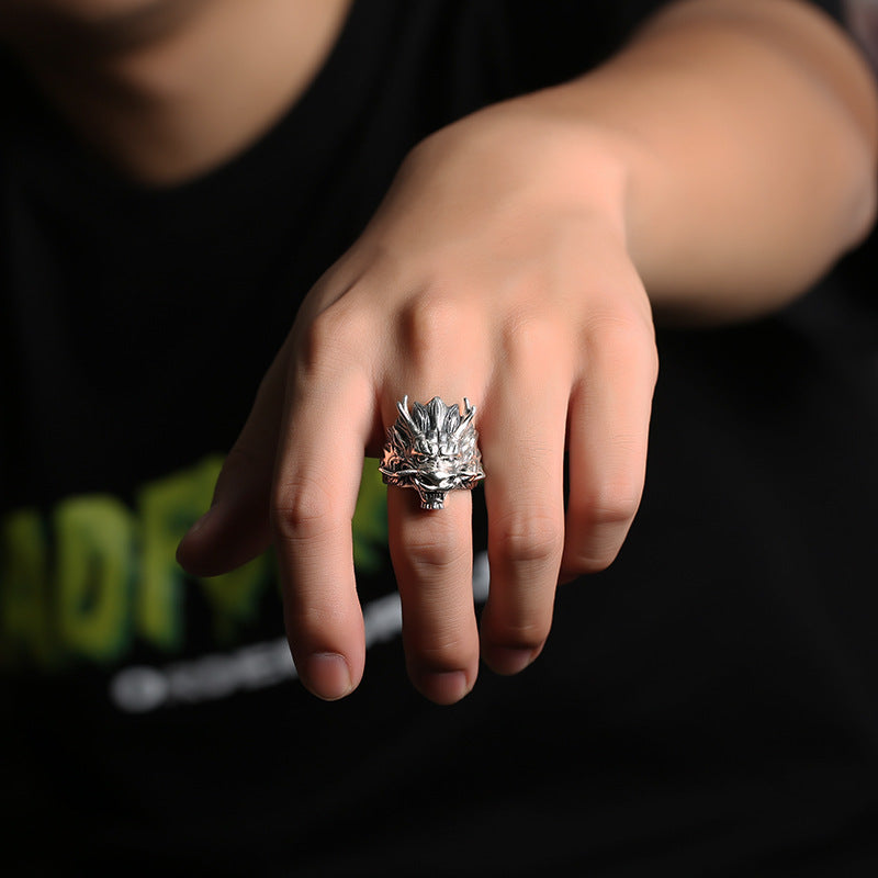 A Maramalive™ Mesmerizing Sterling Silver Dragon Ring with a dragon head on it.