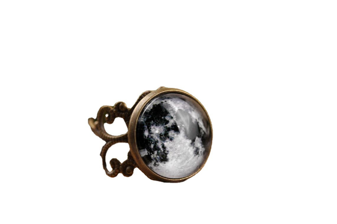 A Vampire Blood Gothic Jewelry Ring with a black and white image of the moon by Maramalive™.