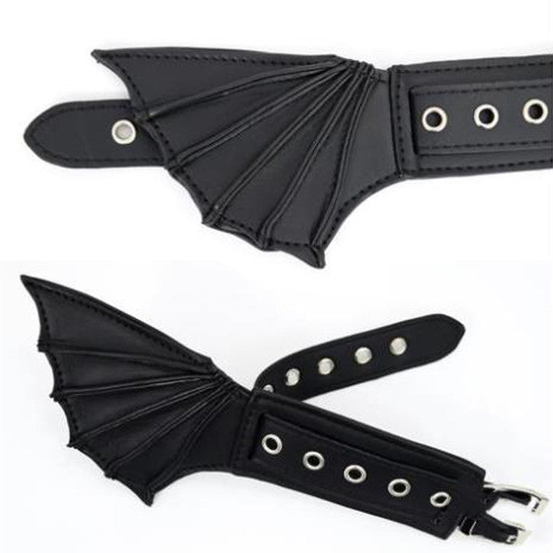 A woman donning Midnight Magic: Fashion Gothic Dark Wind Bat Wings Hand And Foot Accessories with bat wings, adding a touch of gothic glam to her attire. (Brand Name: Maramalive™)