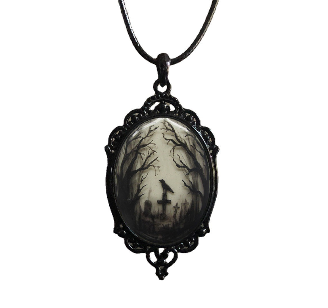 A Gothic Crow Cross Glass Pendant Necklace from Maramalive™ with an image of a crow in the woods.