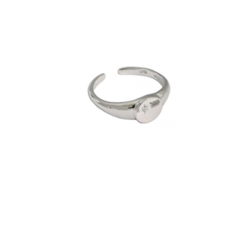A woman's hand is holding a Micro-Set Zircon Sterling Silver Ring from Maramalive™.