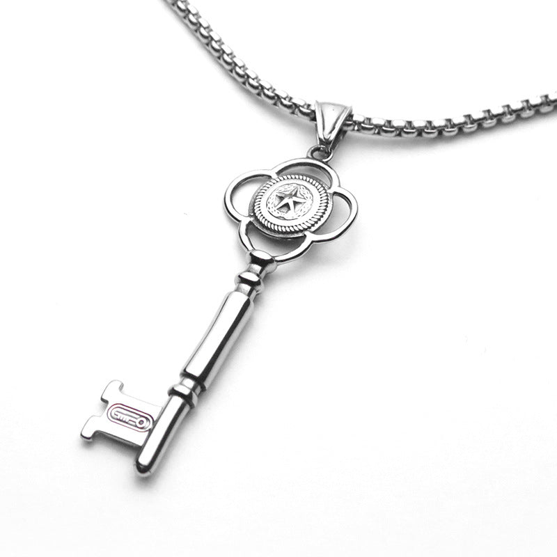A Gothic Key Titanium Steel Pendant Punk Fashionable Stainless Steel Accessory pendant with a pink stone and electroplated silver from Maramalive™.