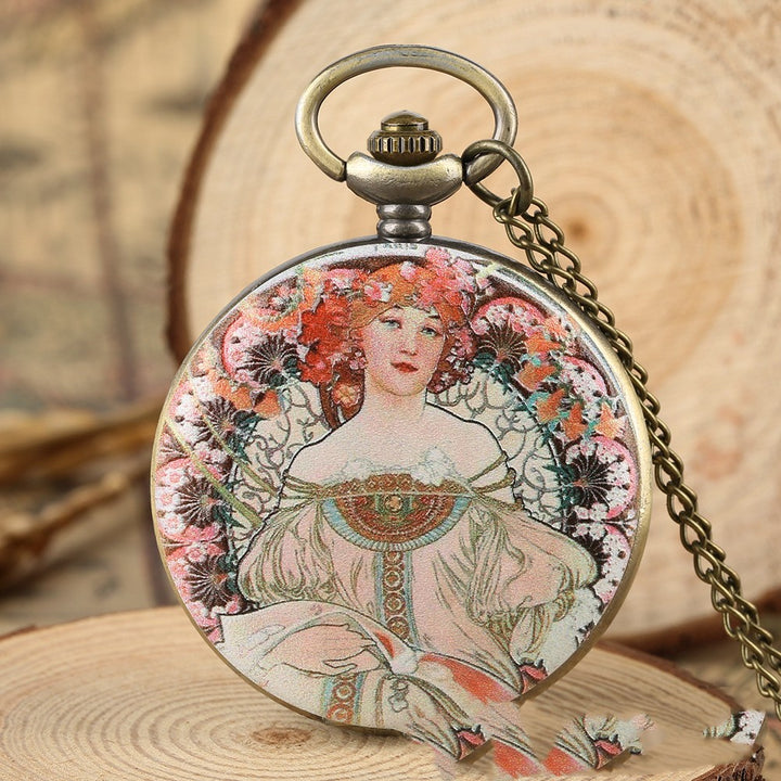 A Maramalive™ Oil Painting Color Goddess Picture Pocket Watch with a woman's face on it, featuring goddess images.