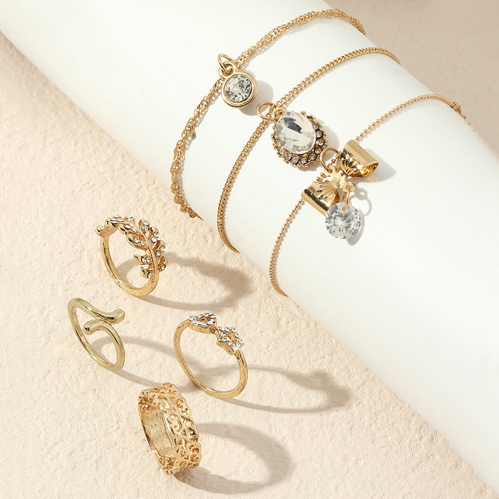 A set of Personality Jewelry Set by Maramalive™, gold-plated bracelets and rings.