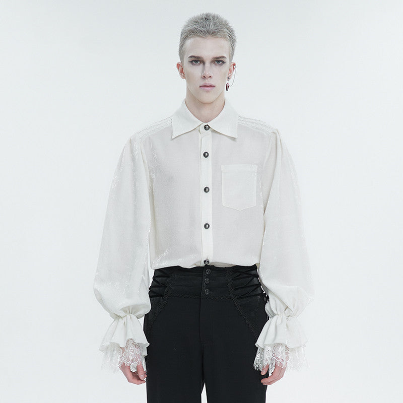 A person with short, light-colored hair wearing a white Maramalive™ Men's Ruffled Gothic Long Sleeved Shirt paired with black pants, standing against a plain white background.