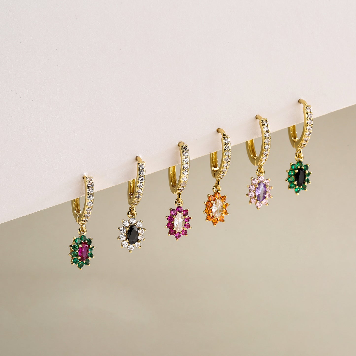 A row of Maramalive™ Minimalist Geometric Zirconia Earrings on a white background.