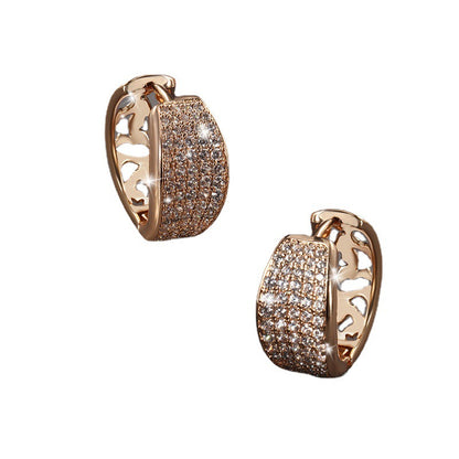 A pair of Women's Fashion Exaggerated Temperamental Earrings by Maramalive™ with diamonds.