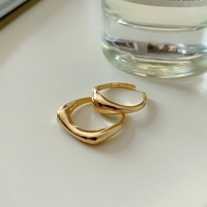 Two Maramalive™ French Minimalist rings on a white surface.