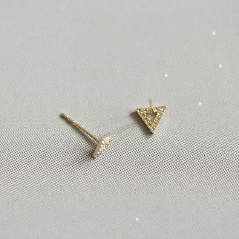 A person holding a pair of Maramalive™ Sterling Silver Gold Ear-ring Clip Hollow Full Diamond Temperament Triangle earrings.