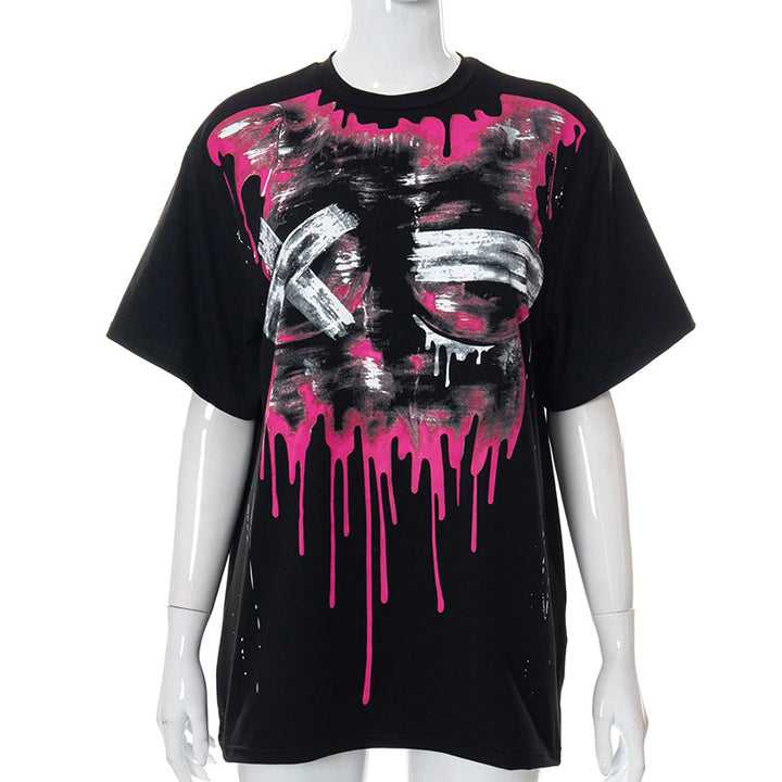 This Chic Oversized Short Sleeve Tees for Women by Maramalive™ on a mannequin features a dripping pink and white abstract design on the front, perfect for a laid-back look.