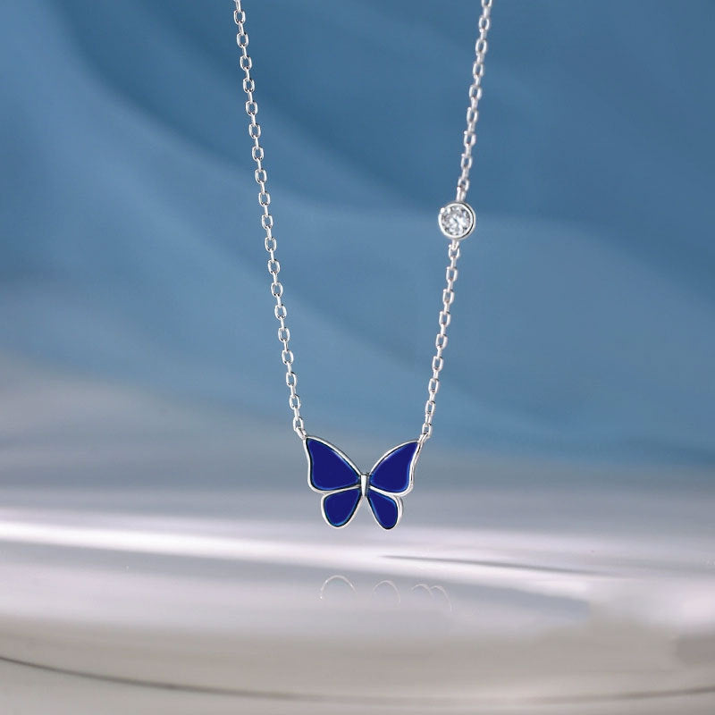 A Maramalive™ S925 Sliver Color-changed Butterfly Necklace Fashion Novelty Jewelry that changes color based on the temperature.