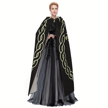 A woman wearing a Maramalive™ 1pc, Nordic Style Viking Goddess Wiccan Wicca Halloween Wizard Witch Hooded Robe Cloak Christmas Hoodies Cape Cosplay For Adult Men Women Party Favors Supplies Dresses Clothes Gifts Costume stands in an elegant vintage black and gray dress.