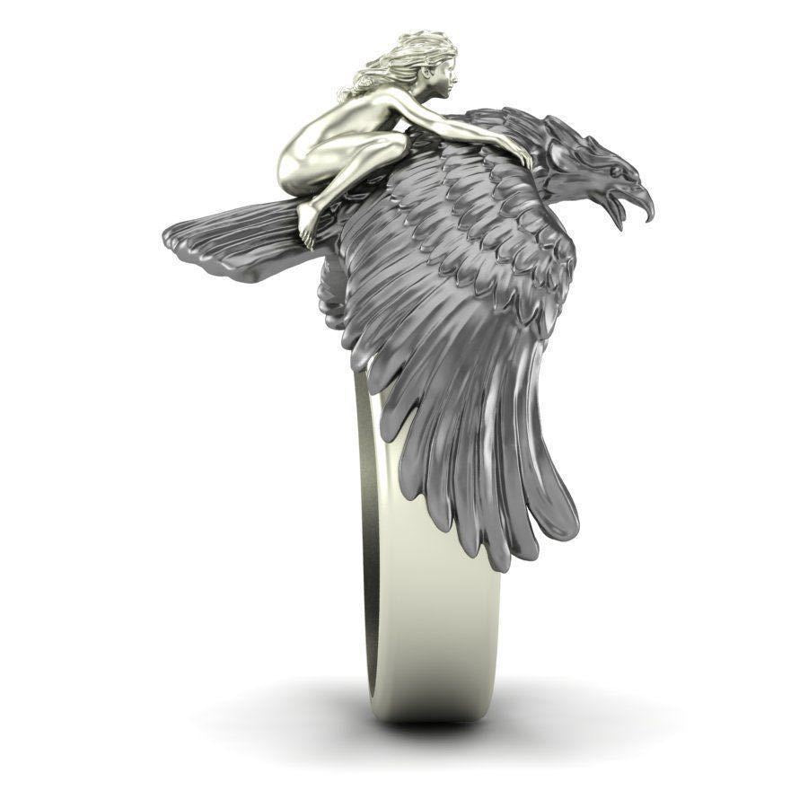 A Golden Eagle Ring with an eagle and a woman on it by Maramalive™.