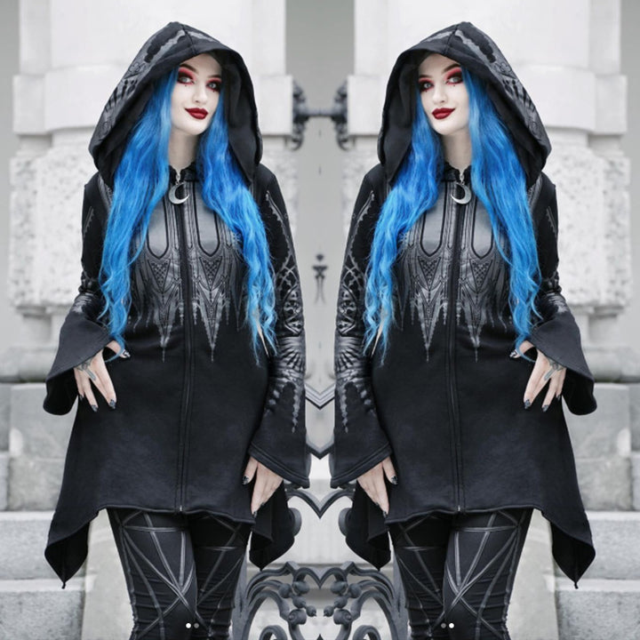 Two women with blue hair, black hoods, and gothic makeup stand side by side in front of a light-colored stone wall, mirroring each other. Dressed in Maramalive™ Halloween Cosplay Hoodie Women's Punk Black Long Hooded Printed Sweater made of polyester fabric, their outfits feature detailed patterns and flared sleeves that add an elegant touch.