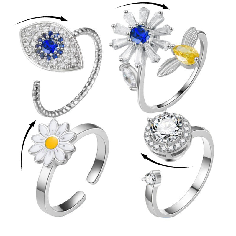 A set of four Turnable Rings Eyes Flowers Anxiety Rings For Women Fidget Spinner Ring Jewelry with blue and white stones from Maramalive™ brand.