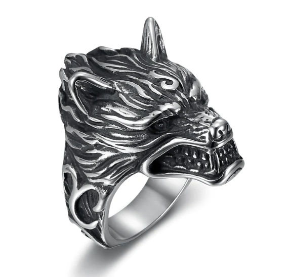 A Handcrafted Stainless Steel Wolf Head Ring by Maramalive™ on a white background.