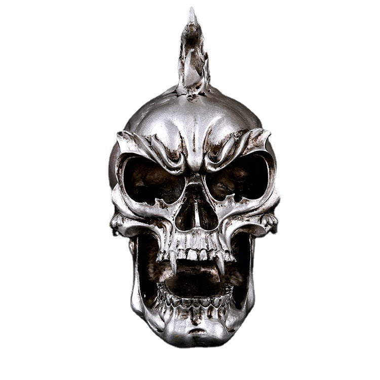 A SILVER RESIN SKULL Head Figure Ornament Occult Skeleton GOTHIC PUNK Decor with flames on it from the brand Maramalive™.