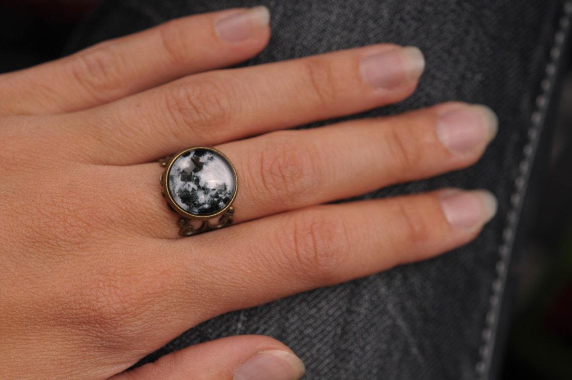 A Vampire Blood Gothic Jewelry Ring with a black and white image of the moon by Maramalive™.