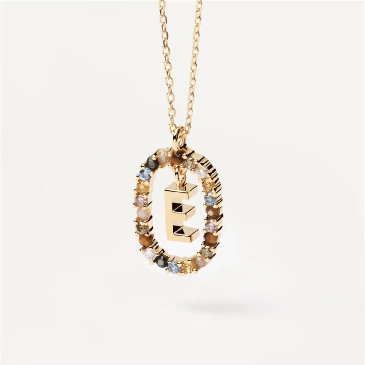 Three Maramalive™ Gorgeous Colored Rhinestone Necklaces with initials on them.