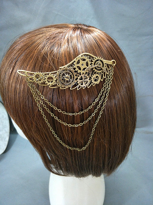 A Maramalive™ mannequin head with Tassel Wings Gear Pointer Punk Barrettes Brooch Dual-use hair piece.