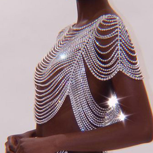 A black woman in a Exaggerated Rhinestone Dress Chain by Maramalive™ posing for a photo.