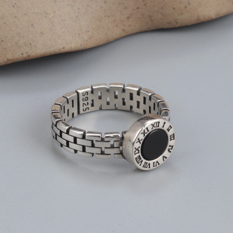 A Sterling Silver Simple Black Onyx Ring from Maramalive™ with an onyx stone on it.