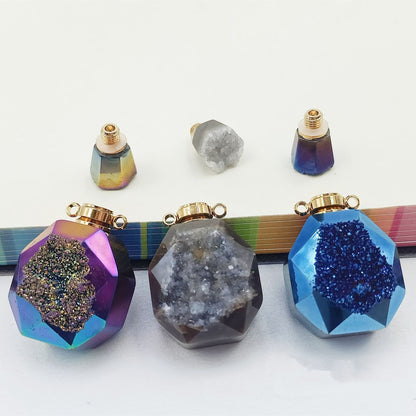 A set of three Agate Crystal Pendant perfume bottles on a table, by Maramalive™.