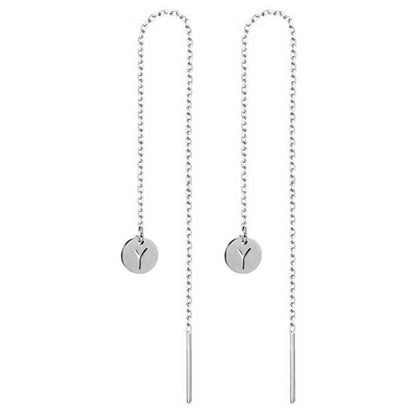 A woman wearing a pair of Maramalive™ Temperament Long Stainless Steel Earrings.