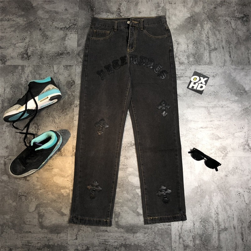 Four pairs of Super High Pants Leather Gothic Letters cross Men's Jeans by Maramalive™ with different designs, including gothic lettering and untamed denim.