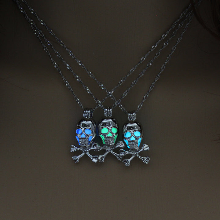 Three Halloween glow-in-the-dark skull necklaces on a mannequin.