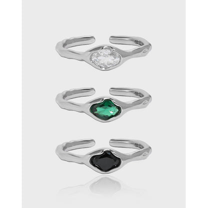 A set of three Micro-Set Zircon Sterling Silver Rings with green and emerald stones from Maramalive™.