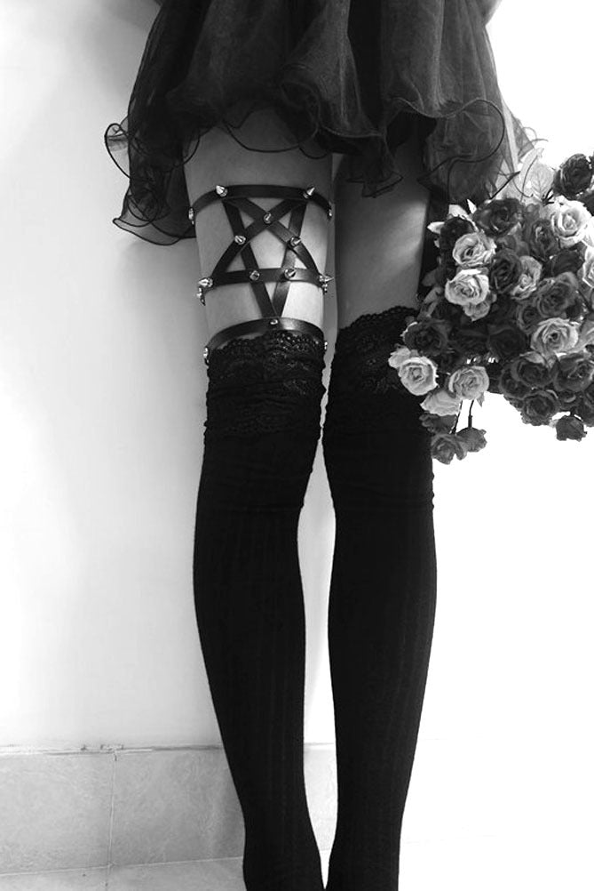 A pair of Maramalive™ Lolita Gothic Punk Leather Leg Ring Sling with spikes on them.