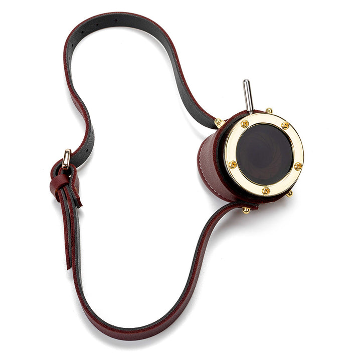 A burgundy leather strap with Halloween Steampunk Retro Goggles attached to it. (Brand Name: Maramalive™)