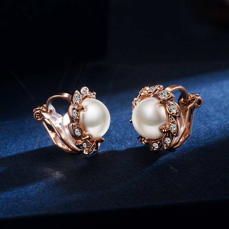 A pair of Maramalive™ Pearl Ear Clip for Women earrings in rose gold.