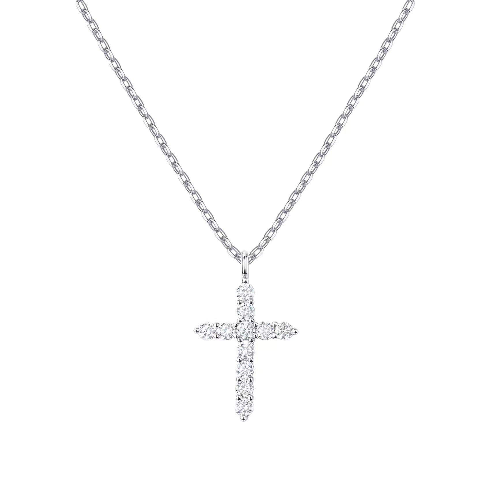 A blonde woman wearing a Maramalive™ Hot New 925 Sterling Silver Necklace Cross Full Diamond Women's Collarbone Chain Wrapped Gold 14k Gold Pendant.