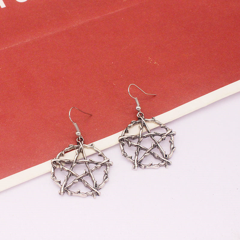 A pair of Dark Punk Gothic Pentagram Of Life earrings by Maramalive™.