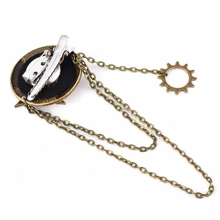 A Maramalive™ Steampunk Barrettes Accessories Clock Gear Brooch with a chain and a clock.