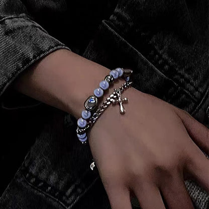 A Maramalive™ Fashion Jewelry Double-layer Reflective Pearl Cross Charmed Bracelet.