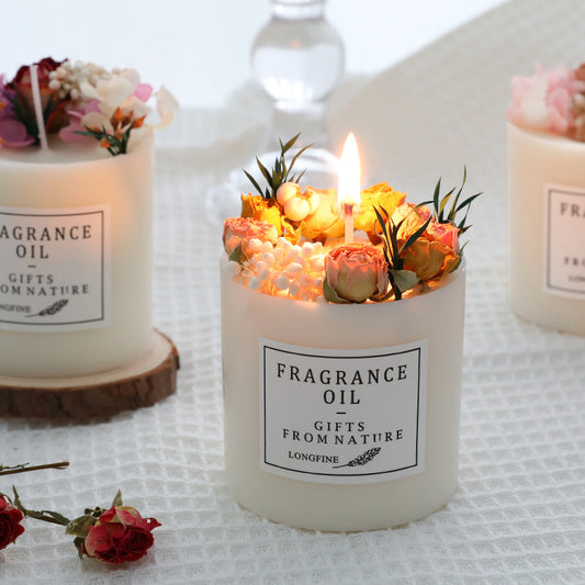 Three Maramalive™ Dried Flowers Decor Romantic Candles in a gift package.