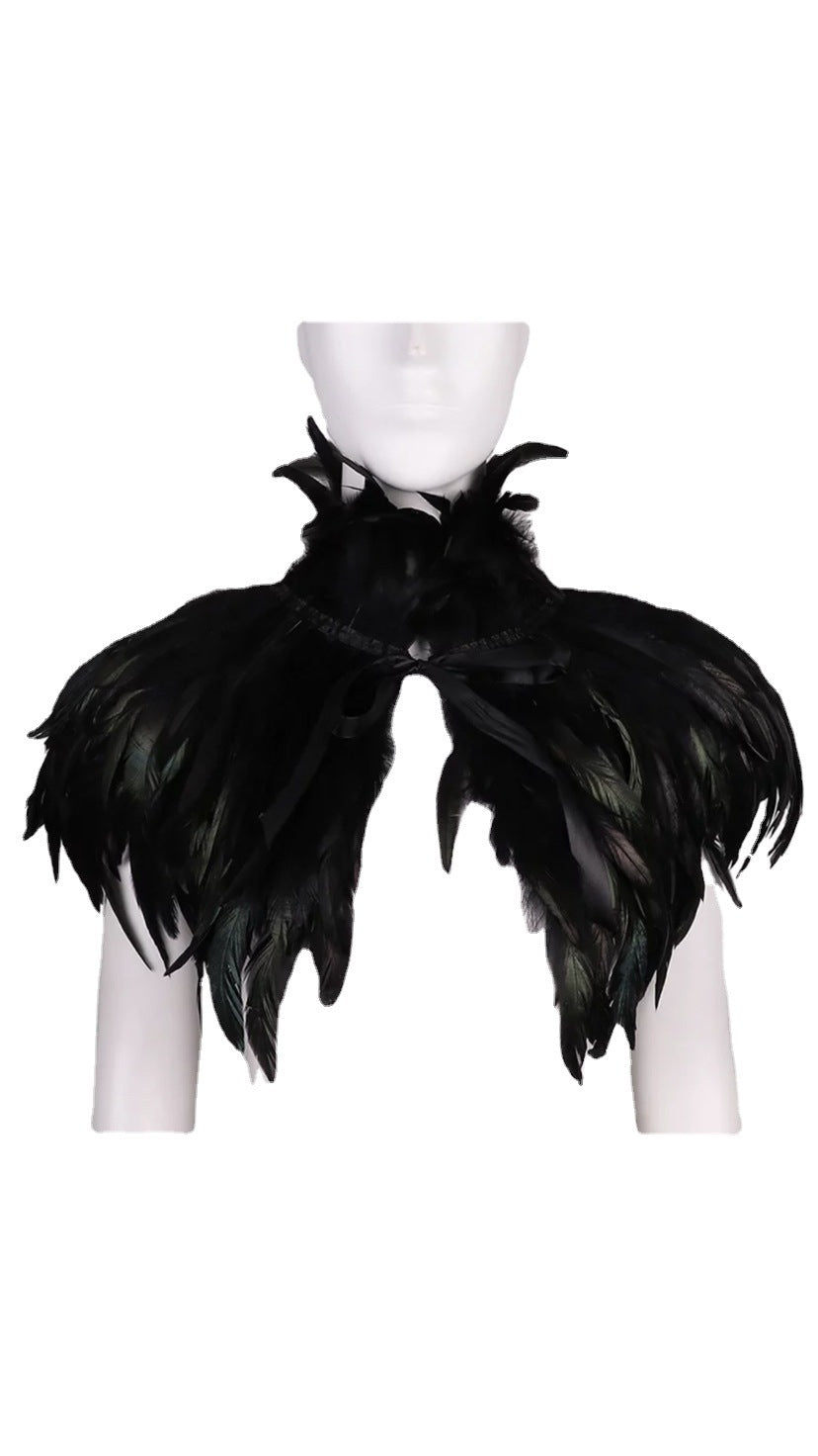 A gothic mannequin wearing The Countess: A Gothic Aristocrat’s Secret Feather Cape by Maramalive™.