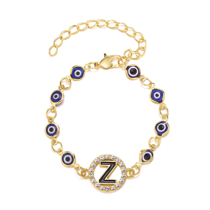 A woman wearing a Stunning Retro Blue Eyes Alloy Adjustable Bracelet for the Inquisitive by Maramalive™ with three evil eye charms.